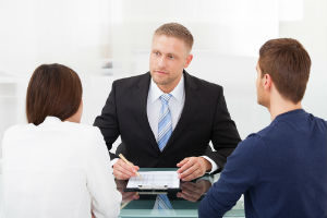 couple meeting with lawyer