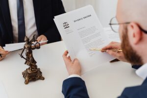 a lawyer reading sa divorce decree document