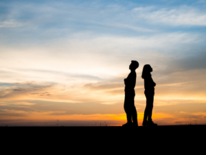 couple conflict in a sunset